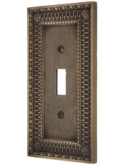 Pisano Single Toggle Switch Plate in Antique Brass.